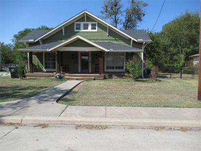 Porch and a front lawn