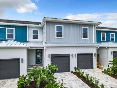 New construction Townhouse house 7838 Spectrum Drive, Kissimmee, FL 34747 - photo 0