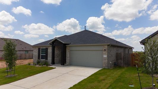 New construction Single-Family house 639 Durian Loop, Buda, TX 78610 - photo 1 1