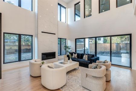 Family Room with Sliding Glass Doors opens to an Approx. 320 Sq.Ft. Covered Patio