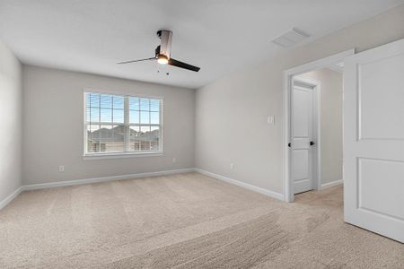 The primary bedroom with gorgeous double doors.