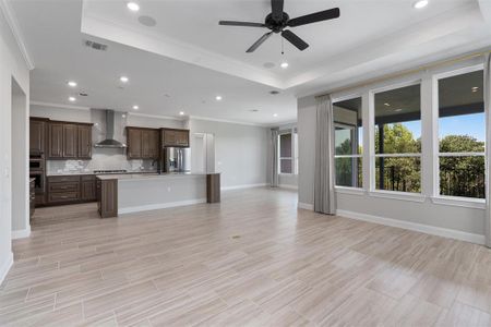 large room just off kitchen and dining room