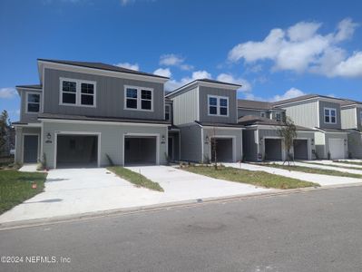 New construction Townhouse house 14495 Macadamia Lane, Unit 316, Jacksonville, FL 32218 - photo 0