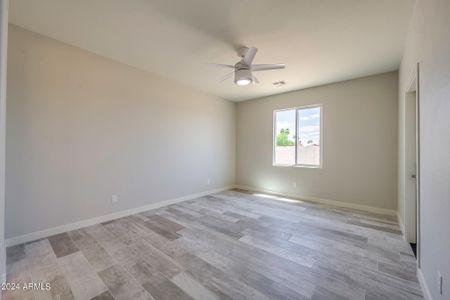 New construction Single-Family house 10591 W Arivaca Drive, Arizona City, AZ 85123 - photo 13 13