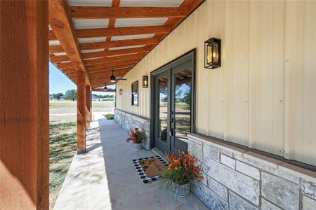 View of patio / terrace featuring ceiling fan