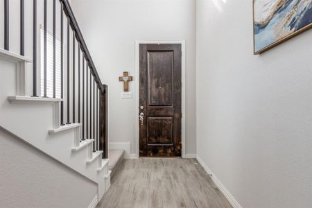 Entryway with light wood-type flooring