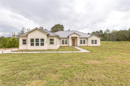 New construction Single-Family house 140 Quiet Springs Trail, Willis, TX 77378 - photo 0