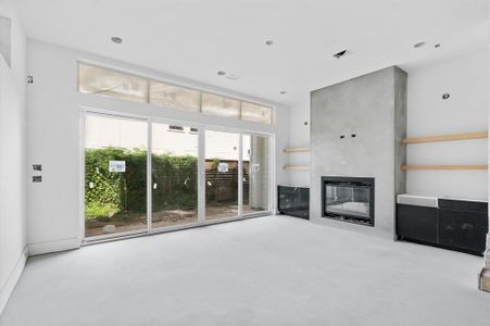 Massive living area that opens to a covered patio.