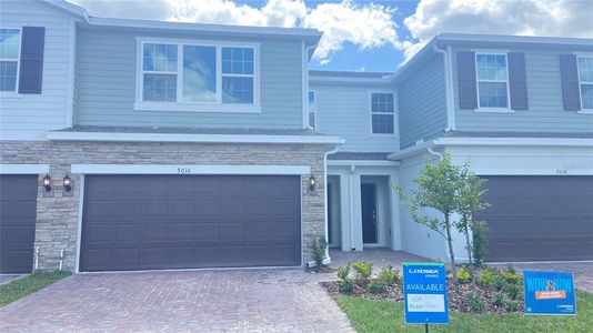 New construction Townhouse house 1203 Woody Cypress Drive, Kissimmee, FL 34746 - photo 0