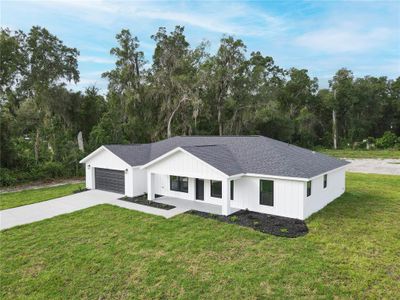 New construction Single-Family house 716 County Road 533, Sumterville, FL 33585 - photo 4 4