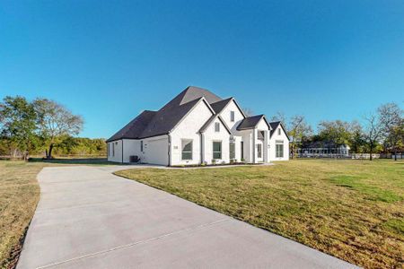 View of front of house with a front lawn