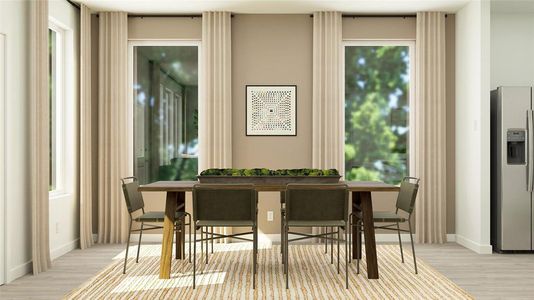 Dining area with light wood-type flooring