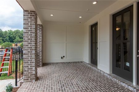 View of patio  with sliding glass doors , Front Entry , not the actual unit