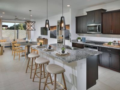 Enjoy the open-concept kitchen complete with the Calm design package.
