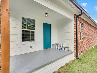 Property back door with a yard