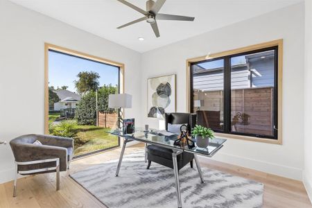 Office featuring light hardwood / wood-style flooring and ceiling fan