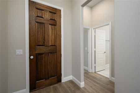 Foyer with hardwood / wood-style floors