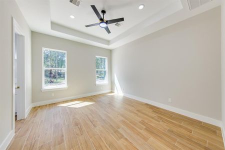 Step into your personal oasis in the primary bedroom, designed for relaxation and comfort. With soft, inviting colors and abundant natural light, this spacious room is your sanctuary at the end of the day.