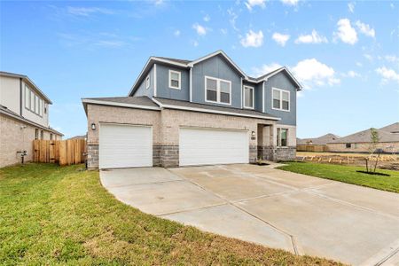 Welcome to this stunning, newly built home featuring a spacious double-wide driveway and a coveted three-car garage.