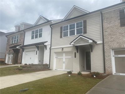 New construction Townhouse house 5346 Fox Den Road, Oakwood, GA 30566 Saxon- photo 0