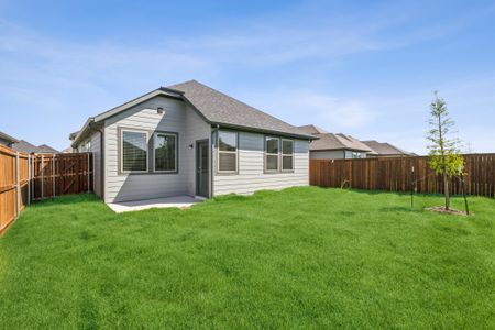 Patio in the Cedar home plan by Trophy Signature Homes – REPRESENTATIVE PHOTO