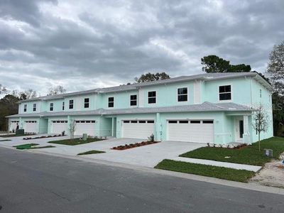 New construction Townhouse house 561 Coronado Cove Road, Unit 007, New Smyrna Beach, FL 32168 - photo 0