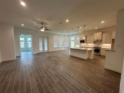 New construction Single-Family house 18327 Tiger Flowers Drive, Conroe, TX 77302 - photo 1 1