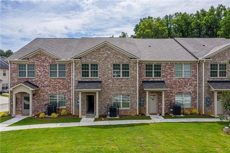 New construction Townhouse house 3413 Hidden Stream Court, Stockbridge, GA 30281 - photo 0