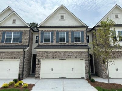 New construction Townhouse house 1593 Gin Blossom Circle, Lawrenceville, GA 30045 Davenport- photo 0