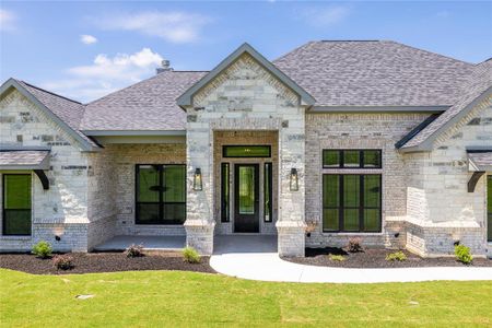 View of front of property with a front lawn