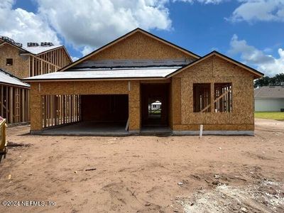 New construction Single-Family house 14687 Macadamia Lane, Unit 39, Jacksonville, FL 32218 - photo 1 1