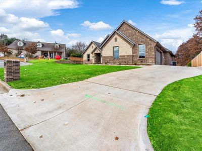 View of front of property featuring a front lawn