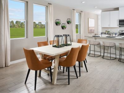 Dining Room of the Acadia floorplan modeled at Park East.