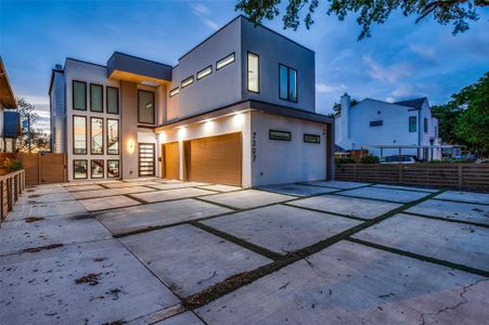 Modern home featuring a garage