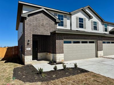 New construction Townhouse house 18616 Cremello Dr, Unit A, Manor, TX 78653 The Pecan- photo 1 1