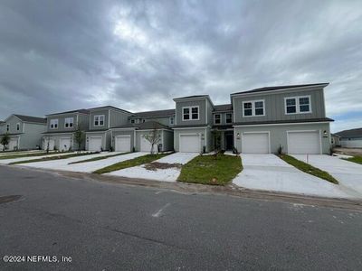 New construction Townhouse house 14471 Macadamia, Unit 322, Jacksonville, FL 32218 - photo 0