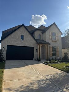 HOME IN PROGRESS - Stunning curb appeal welcomes you with and upgraded elevation and beautifully landscaped gardens!