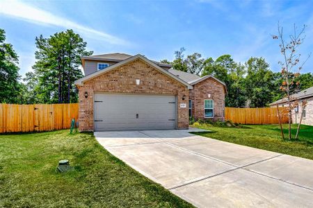 New construction Single-Family house 10711 Lost Maples Drive, Cleveland, TX 77328 - photo 1 1
