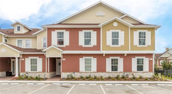 New construction Townhouse house 7566 Sunflower Circle, Kissimmee, FL 34747 - photo 0