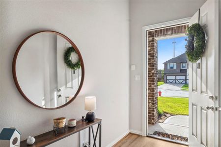 Experience the grandeur of 20-foot-high ceilings as you step into this welcoming home.