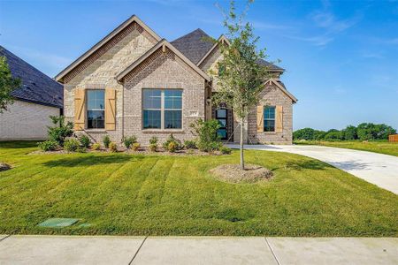 Craftsman house with a front yard