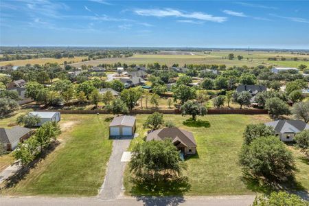 Birds eye view of property featuring a rural view