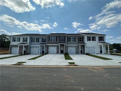 New construction Townhouse house 150 Village Green Drive Nw, Unit 26, Adairsville, GA 30103 - photo 0