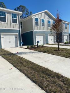 New construction Townhouse house 5928 Creekside Crossing Dr, Jacksonville, FL 32210 - photo 0