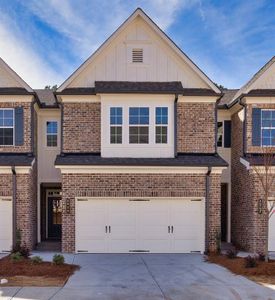 New construction Townhouse house 1569 Gin Blossom Circle, Lawrenceville, GA 30045 The Davenport- photo 0