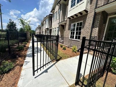 Jacobsen II features a gated front yard