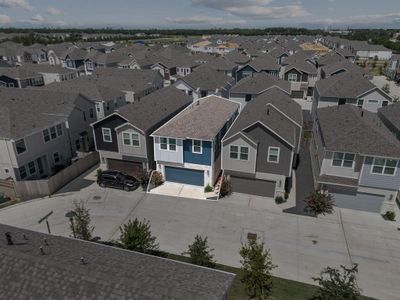 Amazing aerial shot of this gorgeous Meritage home situated on a quiet street in the sought after Pinecrest community, zoned to Spring Branch ISD.