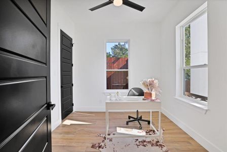 Office featuring ceiling fan and light wood-type flooring