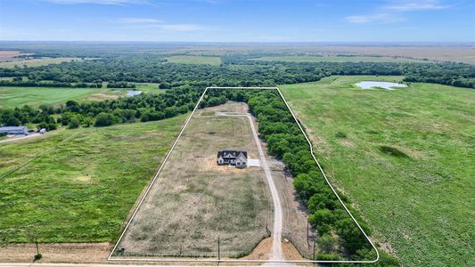 Drone / aerial view with a rural view and a water view