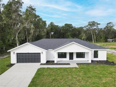 New construction Single-Family house 716 County Road 533, Sumterville, FL 33585 - photo 1 1
